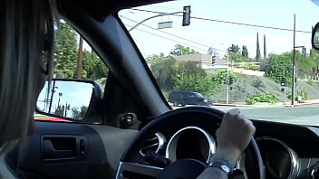 She's got a sleeve of tattoos and black fingernail polish that turns this long haired dude