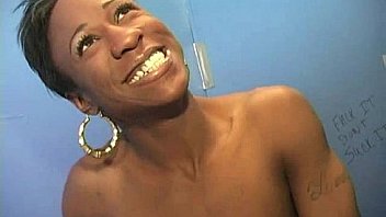 Black chick gives gloryhole blowjob 15