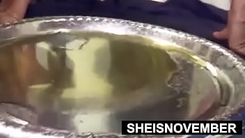 Chubby Black Hottie Msnovember Squatting And Covered In Oil With Saggy Titties And Nipples Exposed While Pee Peeing On Sheisnovember thumbnail