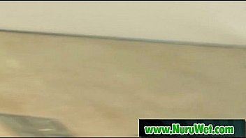 Spicy masseuse gives a slippery nuru massage 01