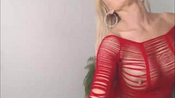 Busty milf in red lingerie toying cunt