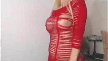 Busty milf in red lingerie toying cunt