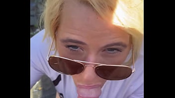 Real hooker sucks cock in public wearing sunglasses then lets the guy nut on her face Real hooker sucks cock in public wearing sunglasses then lets the guy nut on her face