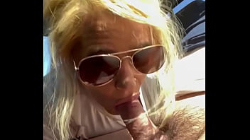 Real hooker sucks cock in public wearing sunglasses then lets the guy nut on her face