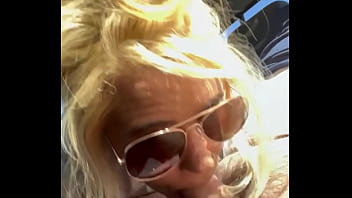 Real hooker sucks cock in public wearing sunglasses then lets the guy nut on her face