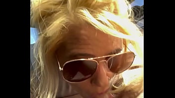 Real hooker sucks cock in public wearing sunglasses then lets the guy nut on her face