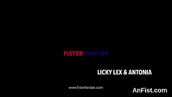 Lezzie sweetie gets her shaven cunt and ass hole fist fucked