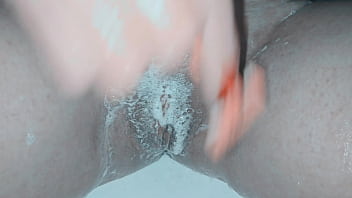 Milf shaving her pussy up close and lots of soap