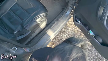 Black lynn sucks cock in a car at sunset