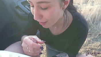 Black lynn sucks cock in a car at sunset