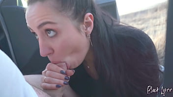 Black lynn sucks cock in a car at sunset