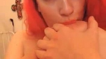 Big tits redhead rubs clit on webcam