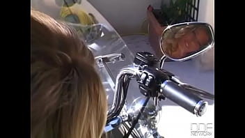 Sexy babe michelle enjoys a cigar