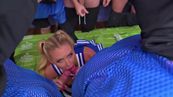 Cheerleaders warm up football players with a blowbang before the gangbang