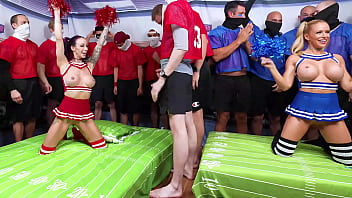 Cheerleaders warm up football players with a blowbang before the gangbang
