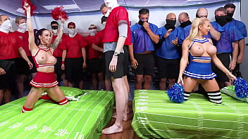 Cheerleaders warm up football players with a blowbang before the gangbang