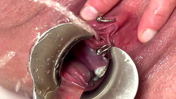 Strong stream pee from my spread out pussy by speculum
