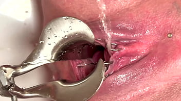 Strong stream pee from my spread out pussy by speculum