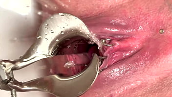 Strong stream pee from my spread out pussy by speculum