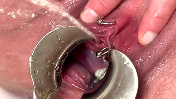 Strong stream pee from my spread out pussy by speculum