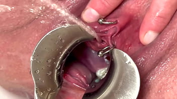 Strong stream pee from my spread out pussy by speculum