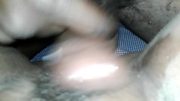 Stimulating her pussy with cock