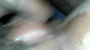 Stimulating her pussy with cock