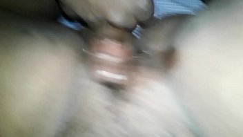 Stimulating her pussy with cock