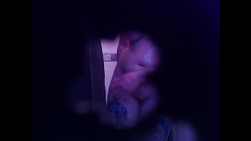 Inked babe gets naked and showers