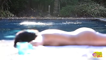The Individual With Attractive Dark Hair Has A Fondness For Engaging In Oral Stimulation Of The Female Genitalia With Her Female Partner Subsequent To The Latter's Departure From The Swimming Pool thumbnail