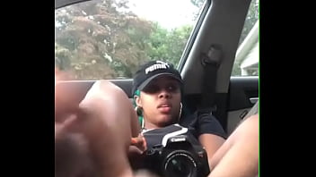 Hot ebony slut footjob to black cock in car