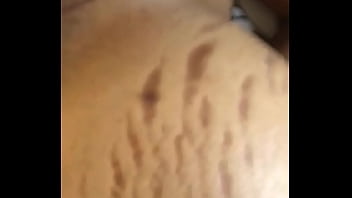 Stretching her from behind