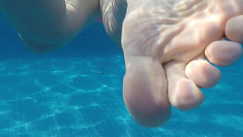 Wife thong swimming in pool