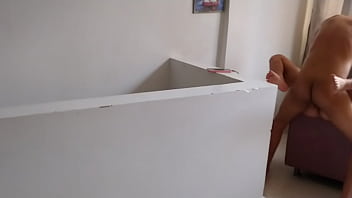 Rough fuck in the couch near the window and cuckold watches us