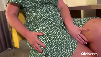 Busty mature candy cummings strips and plays with sex toys