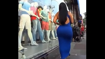 Ebony beauty with gorgeous ass walking on a street