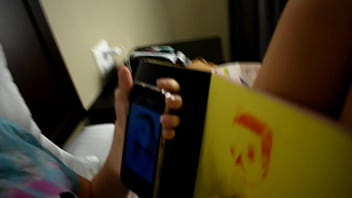 Cute teen porn star drawing a picture while sitting on a bed before she gets used sexually