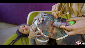 Tatted teens ramming huge toys into each other’s holes