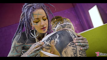 Tatted teens ramming huge toys into each other’s holes