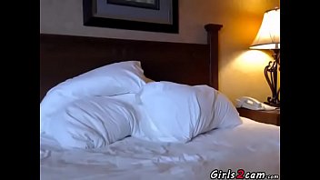 Busty brunette teen masturbates on the bed