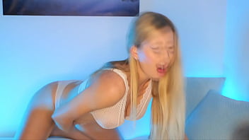 Pretty woman masturbates through panties and moans