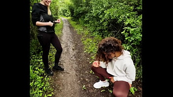 Lady ana pisses in front of rebel rhyder in the woodspeeing