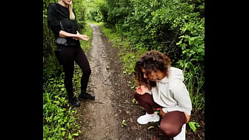 Lady ana pisses in front of rebel rhyder in the woodspeeing