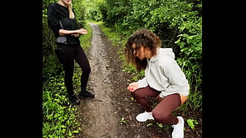 Lady ana pisses in front of rebel rhyder in the woodspeeing