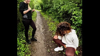 Lady ana pisses in front of rebel rhyder in the woodspeeing