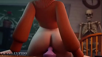 Velma juega con un consolador