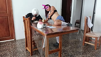 She climbs on the table and opens her pussy