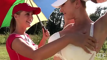 Busty lesbo babes on the golf field