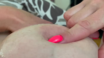 Pierced nipples playing after cum on my tits at morning