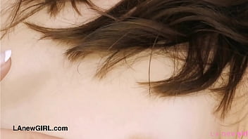 Alluring brunette model naked close up